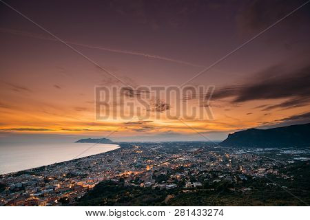 Terracina, Italy. Top View Skyline Cityscape City In Evening Sunset. City Illuminations.