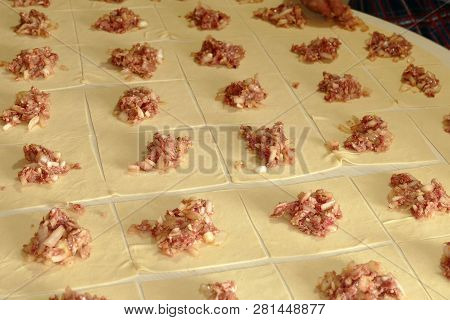 Kyrgyz Ravioli, A Woman Doing Ravioli, Meat Ravioli, Pasty Woman Who.make Ravioli With Dough.