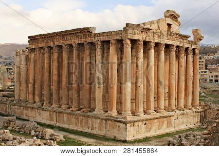 Baalbek - Ruins Of The Bacchus Temple In The Ancient Phoenician City With Range Of Mountains At The 