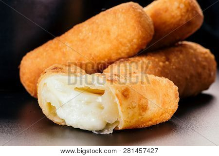 Close Up Of Appetizers Called Tequeños Made Of Fried Corn Filled With Cheese