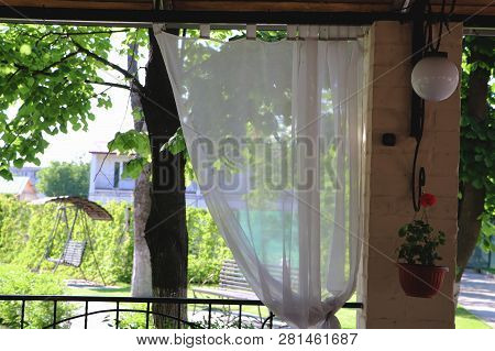 Summer Restaurant Terrace Or Veranda Interior With Open Space. Grass Decor And Garden View.