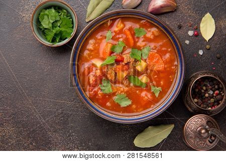Thick Tomato Soup With Meat, Cereals And Vegetables. Traditional Oriental Cuisine, Spicy Stew With B