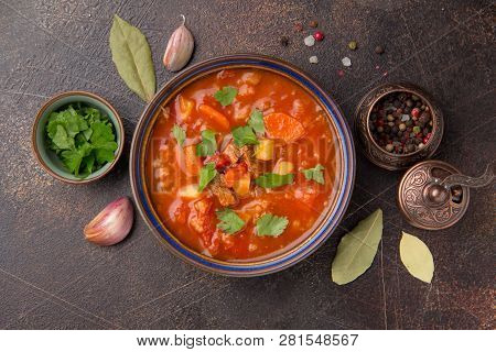 Thick Tomato Soup With Meat, Cereals And Vegetables. Traditional Oriental Cuisine, Spicy Stew With B