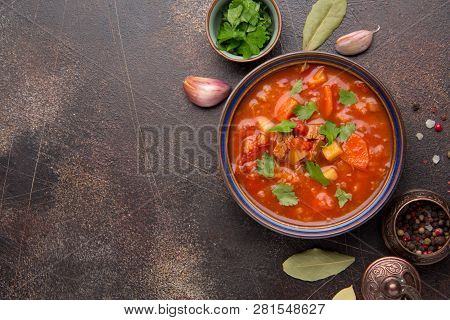Thick Tomato Soup With Meat, Cereals And Vegetables. Traditional Oriental Cuisine, Spicy Stew With B