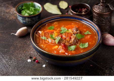 Thick Tomato Soup With Meat, Cereals And Vegetables. Traditional Oriental Cuisine, Spicy Stew With B