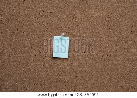 Horizontal Cork Board With Many, Sticky Notes Pinned