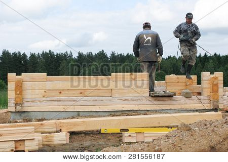 Minsk Region. Belarus. February 24, 2016. Workers Drill Holes For Driving Nagel. Construction Of Bon