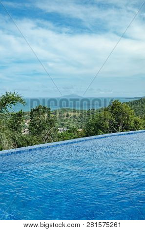 Pool On The Edge Of A Hill With A View To The Sea. Infinity Pool. Ilha Do Arvoredo Island On Backgro