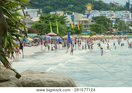 Bombinhas - Sc, Brazil - December 21, 2018: View Of Praia De Bombinhas Beach On A Sunny Day. Season 