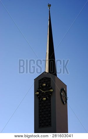 The Modern Clock Tower Of The Catholic Parish Church St. Agatha In Aschaffenburg.