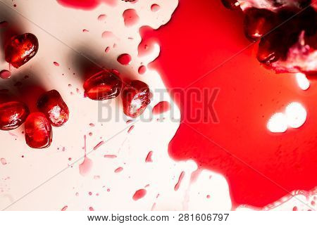 Closeup View Of Grain Red Grenades. Juicy Ripe Red Granets Or Garnets. Fruits Of Red Ripe Pomegranat