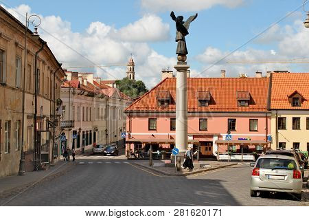 Lithuania, Vilnius; August 14th 2017 - Angel Square In Vilnius In Lithuania With A Monument Of Patro