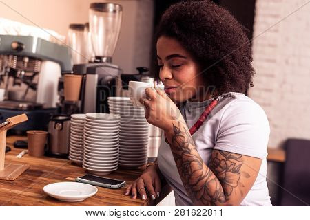 Nice Afro American Woman Smelling Her Coffee