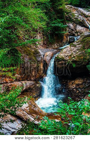 Mountain Cascade Waterfall. Eastern Abkhazia. Near The Town Of Tkvarcheli. Akarmara District.