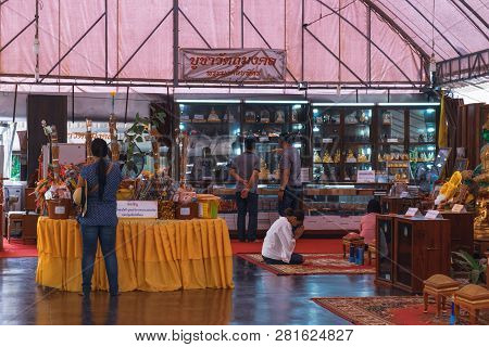 Ayutthaya, Thailand - February 5, 2018: Thai People Visit And Respect Praying Buddha Relics At Moder