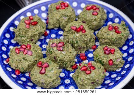 Pkhali, A Georgian Vegetable Dish With Spinach, Walnuts And Pomegranate Seeds