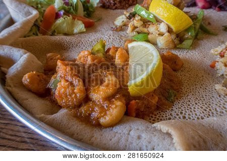Injera Is A Sourdough Flatbread Made From Teff Flour.  It Is The National Dish Of Ethiopia, Eritrea,