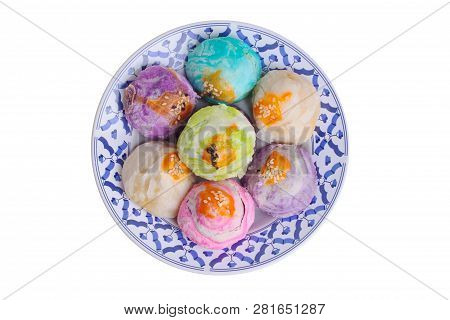 Colorful Chinese Pastry Moon Cake On Thai Style Plate .