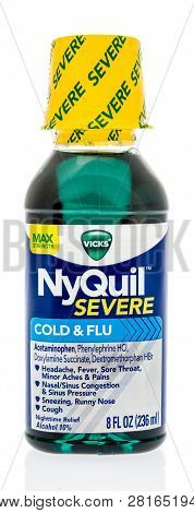 Winneconne, Wi - 23 January 2019: A Bottle Of Nyquil Severe Cold And Flu Medicine On An Isolated Bac