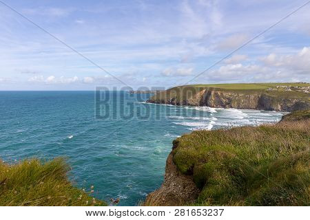 A Landscape View Of Mawgan Porth From The South West Coast Path, North Cornwall Along The Atlantic C