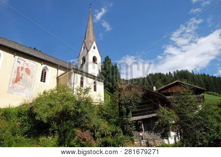 PETSCHIED, ITALY - JULY 14, 2018: Saint Nicholas church in Petschied near Luson, Italy
