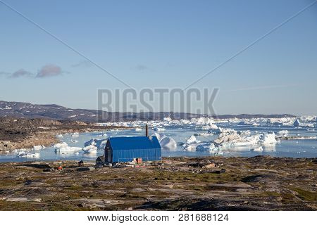 Rodebay, Greenland - July 09, 2018: The Local Waste Incineration Plant. Rodebay, Also Known As Oqaat