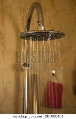 Shower Room Brown Tones, Water Flows From The Round Shower