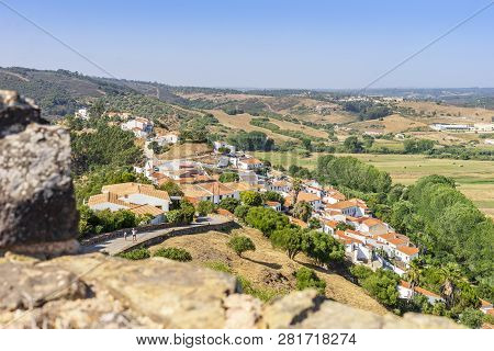 Charming Aljezur With The Moorish Castle In Foreground, Portugal