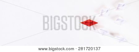 Red Paper Boat Among Other White. Leadership, White Crow, Individuality. Piranhas And A Shark. Not L