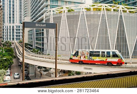Miami, Usa - October 30, 2015: Train Arrive At Brickell Station With Downtown Skyscrapers On Urban B