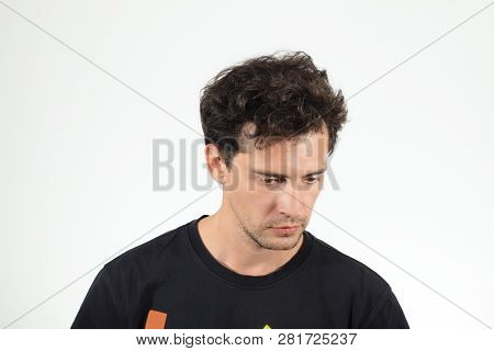 Sad Man In Black T-shirt Looking Down