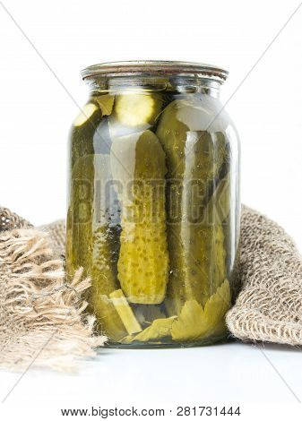 Pickled Cucumbers Isolated. Pickles In Glass Jar Isolated On White Background. Salted Cucumber In Ja