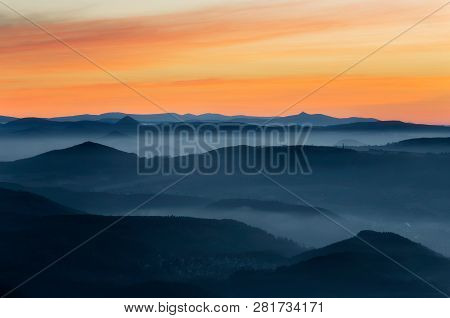 Dramatic Sunrise Over Beautiful Mountain Peaks. Czech National Park. Colorful Sky With Clouds And Su
