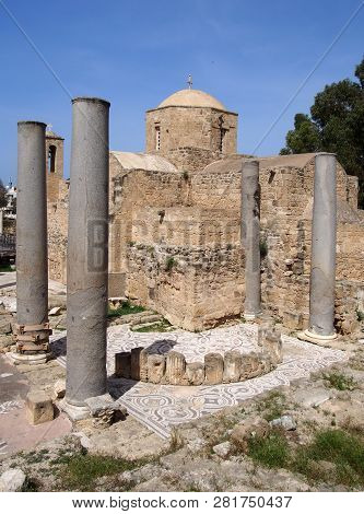 The Historic Church Of Yia Kyriaki Chrysopolitissa In Paphos Cyprus Showing The Building And The Sur