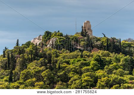 Athens, Greece - November 1, 2017: View On The Philopappos Monument On Top Of Mouseion Hill From Acr