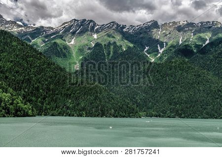 Mountains Surrounding Ritsa Lake In An Abkhazia