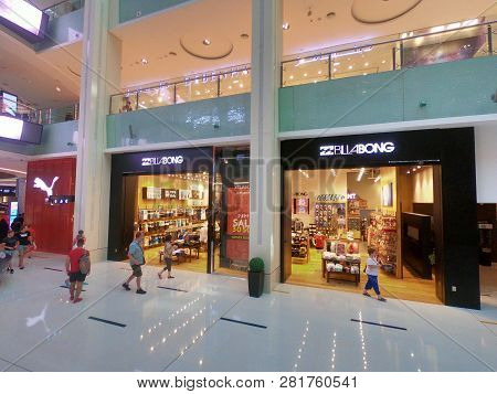 Dubai Uae - January 2019 - Debenhams, Billabong And Puma Shops At Mall - Interior View Of The Worlds