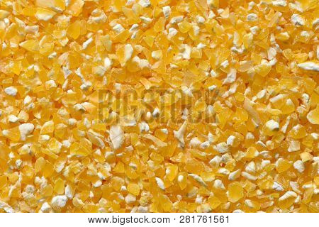 Yellow Corn Grits Close-up. Raw Corn Grits For Breakfast Porridge