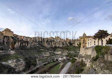 Cuenca , Spain; February 2017:  This View Shows The Hanging Houses Perched On The Cliffside And Brid