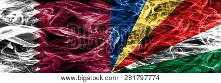 Qatar Vs Seychelles, Seychelloise Smoke Flags Placed Side By Side. United Arab Emirates. Uae