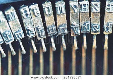 Close-up Detail Of Typebars. Traditional Typewriter Letterpress Arms.