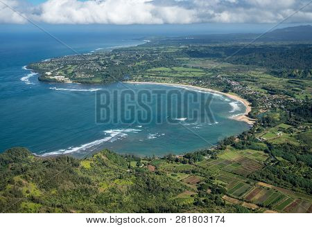 Aerial View Of Hanalei Bay And Princeville On Hawaiian Island Of Kauai From Helicopter Flight