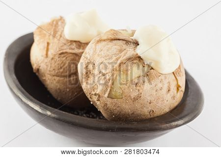 Traditional Colombian Cooked Potatoes Called Papas Saladas Topped With Mayonnaise Isolated On White