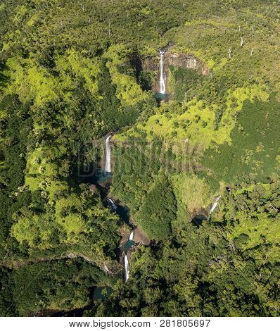 Aerial View Of Manawaiopuna Falls And Landscape Of Hawaiian Island Of Kauai From Helicopter Flight