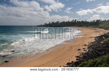 Tourists On Donkeys Or Paliku Beach On The Coast Of Kauai In Hawaii