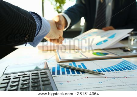 Businessman In Sut Hand Shake In Ofiice Closeup. Introduce Manager Job Man Risk Chart Paper How Deal
