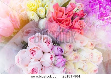 Blurred Colorful Bouques Rose Flowers Blossom In Fresh Flower Shop Background With Vintage Filter.