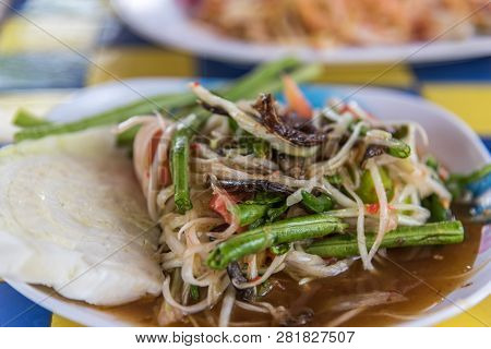 Papaya Salad Or Papaya Pok Pok (som Tum) For Sale At Thai Street Food Market Or Restaurant In Thaila