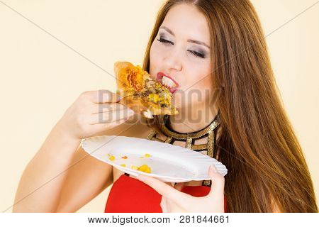 Young Woman Eating Hot Fresh Pizza Slice. Delicious Fast Food Meal. People, Italian Cuisine Concept.