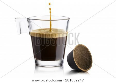 Black Coffee In Glass Cup With Coffee Waffle And Jumping Drop On White Background